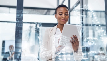 Woman checking reports in an office